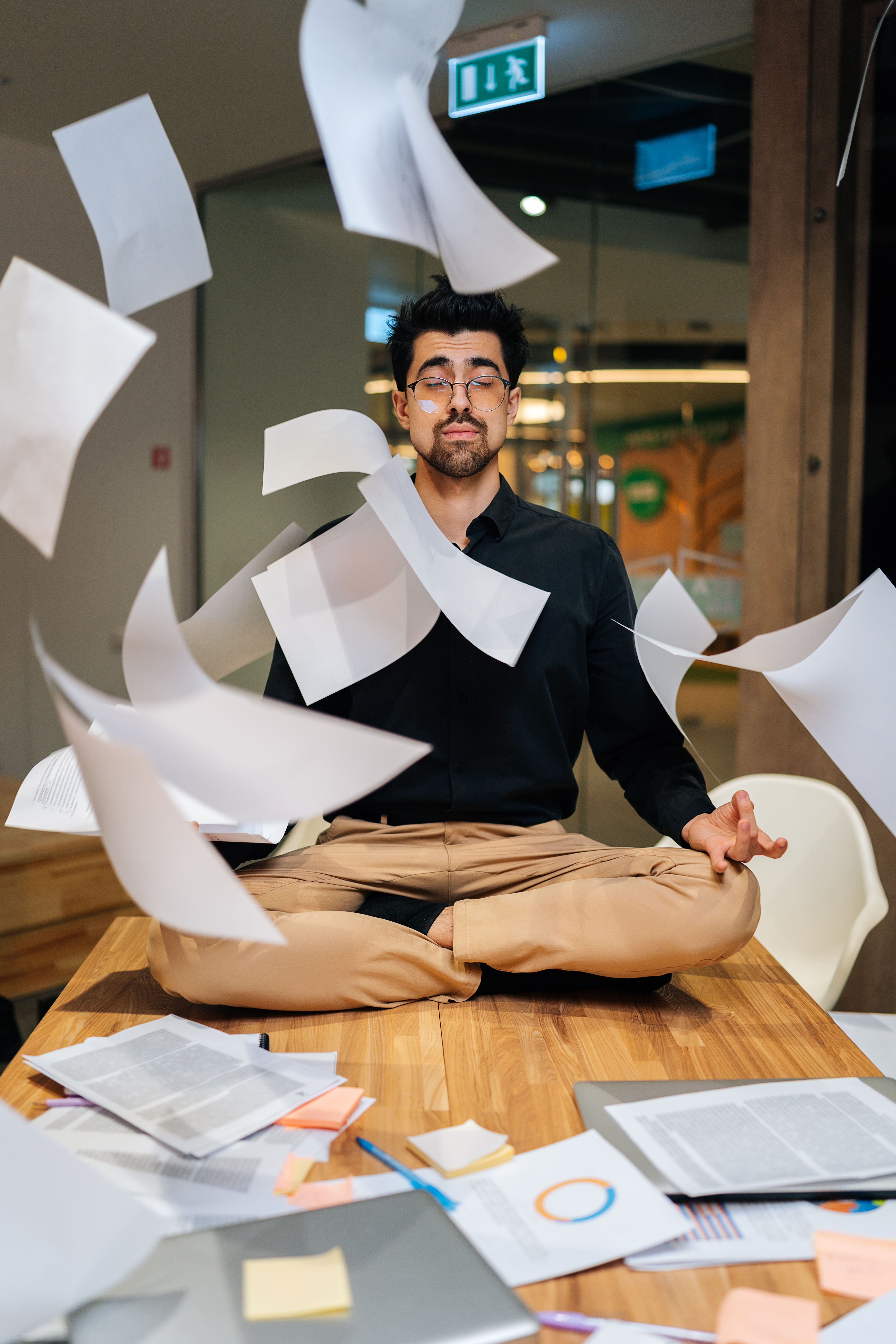 Professional taking a moment of stillness in the office